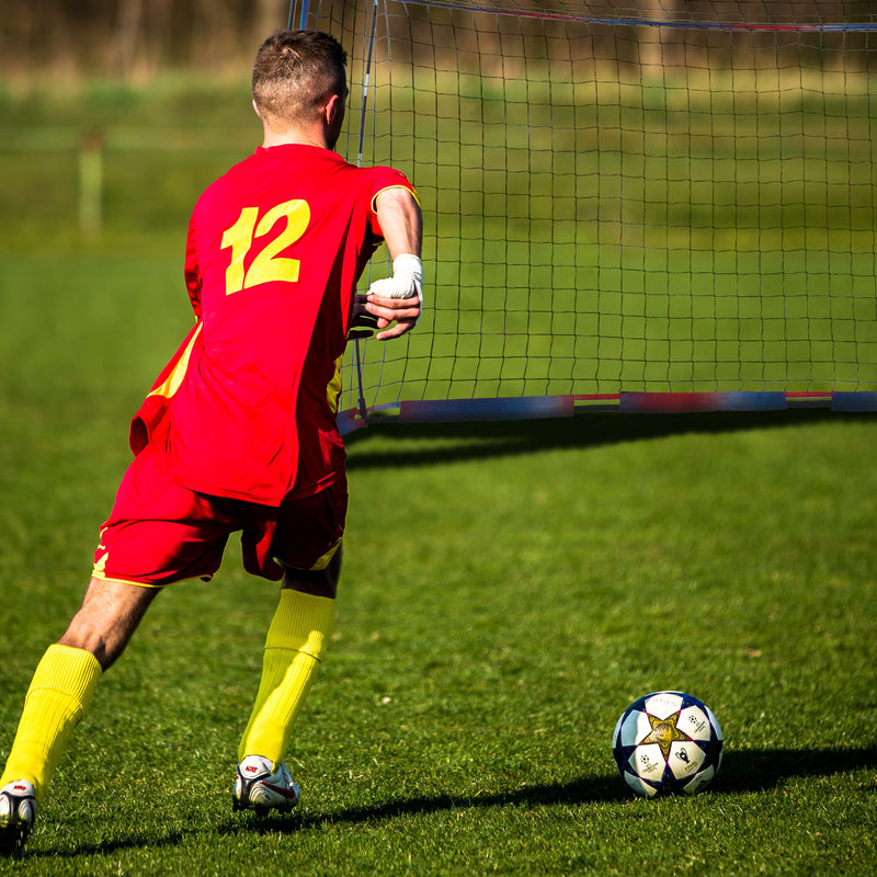 Load image into Gallery viewer, Kid playing soccer with 12' x 6' Portable Soccer Goal Net